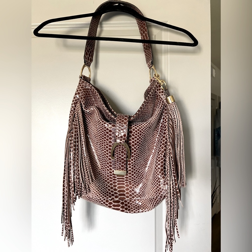Dark red leather Cobra G.I.L.I. Hobo with fringe details.